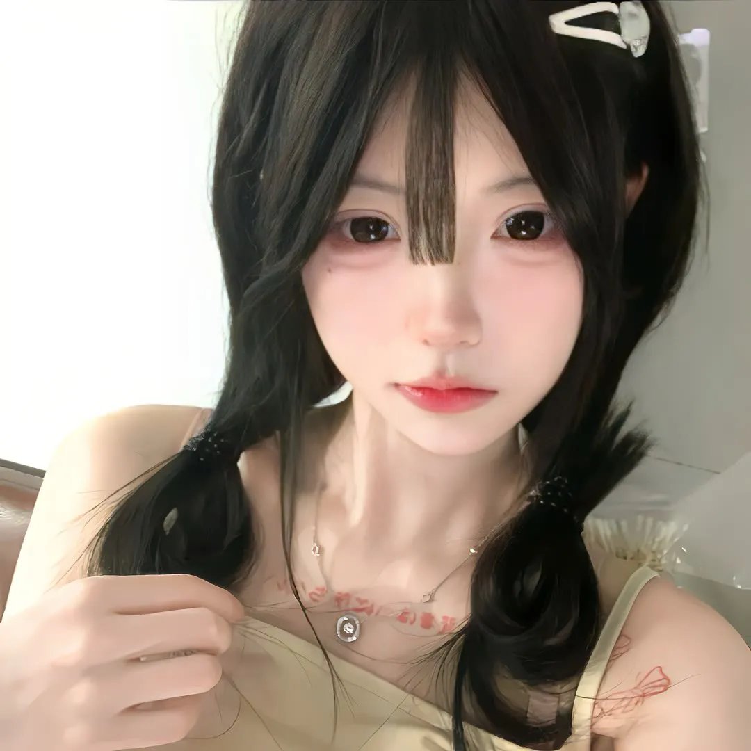 彼女